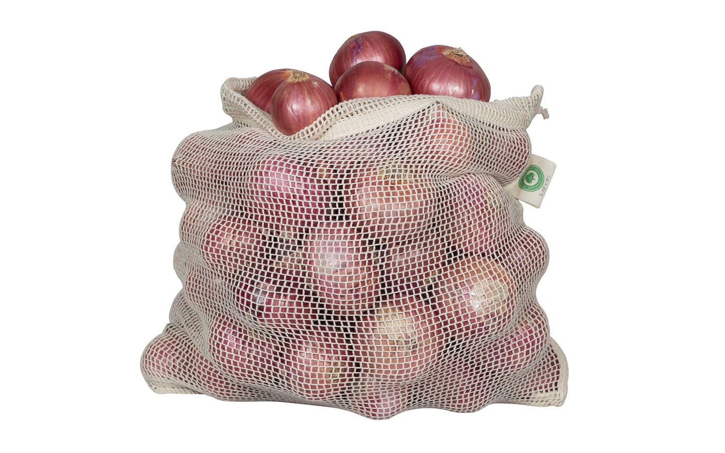 Mesh produce bag filled with red onions on a white background