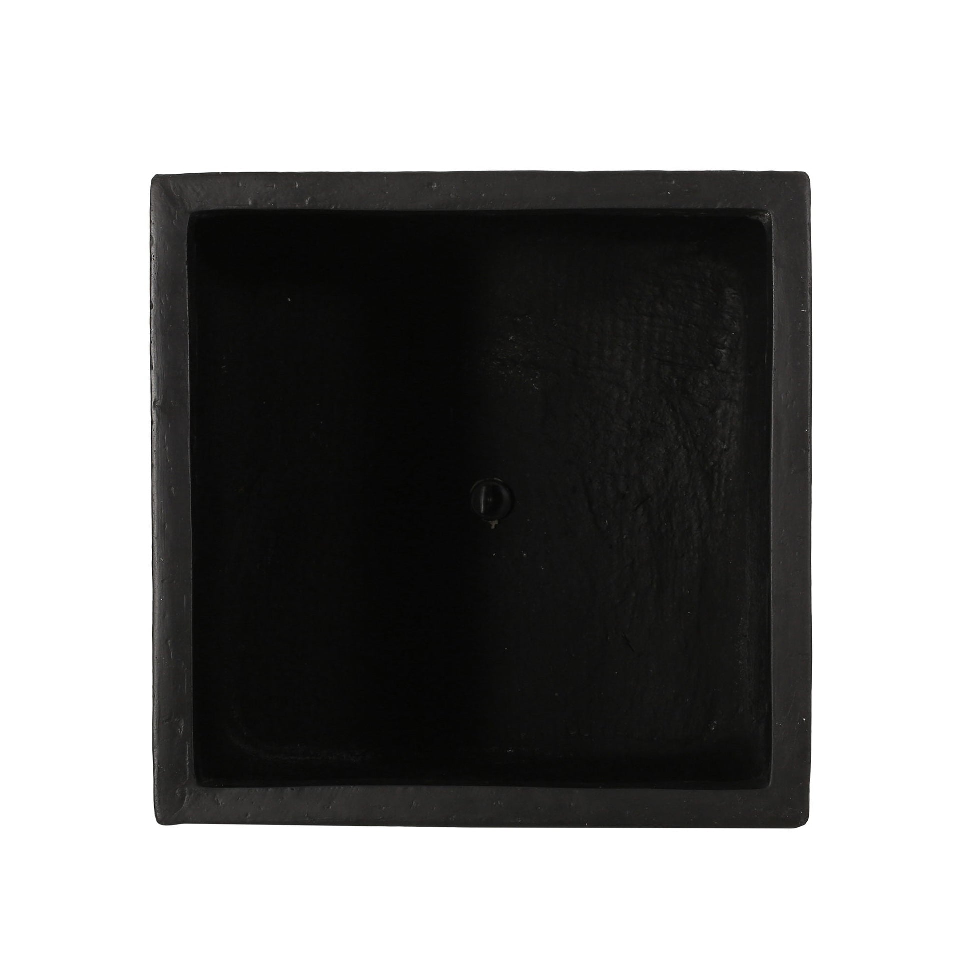 Black square stone on a white background