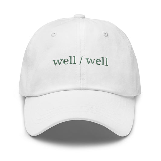 White cap with 'Cincinnati' embroidery on a white background