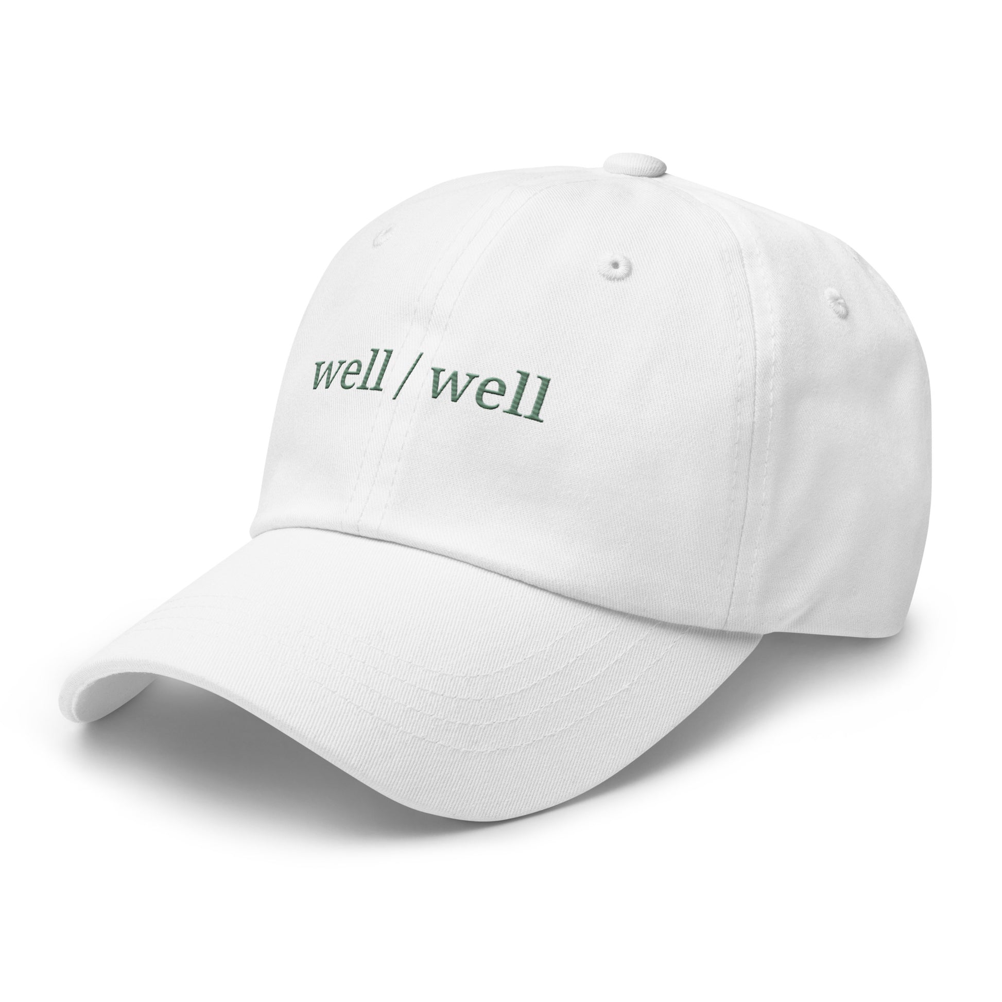 White cap with 'well/well' text on a white background