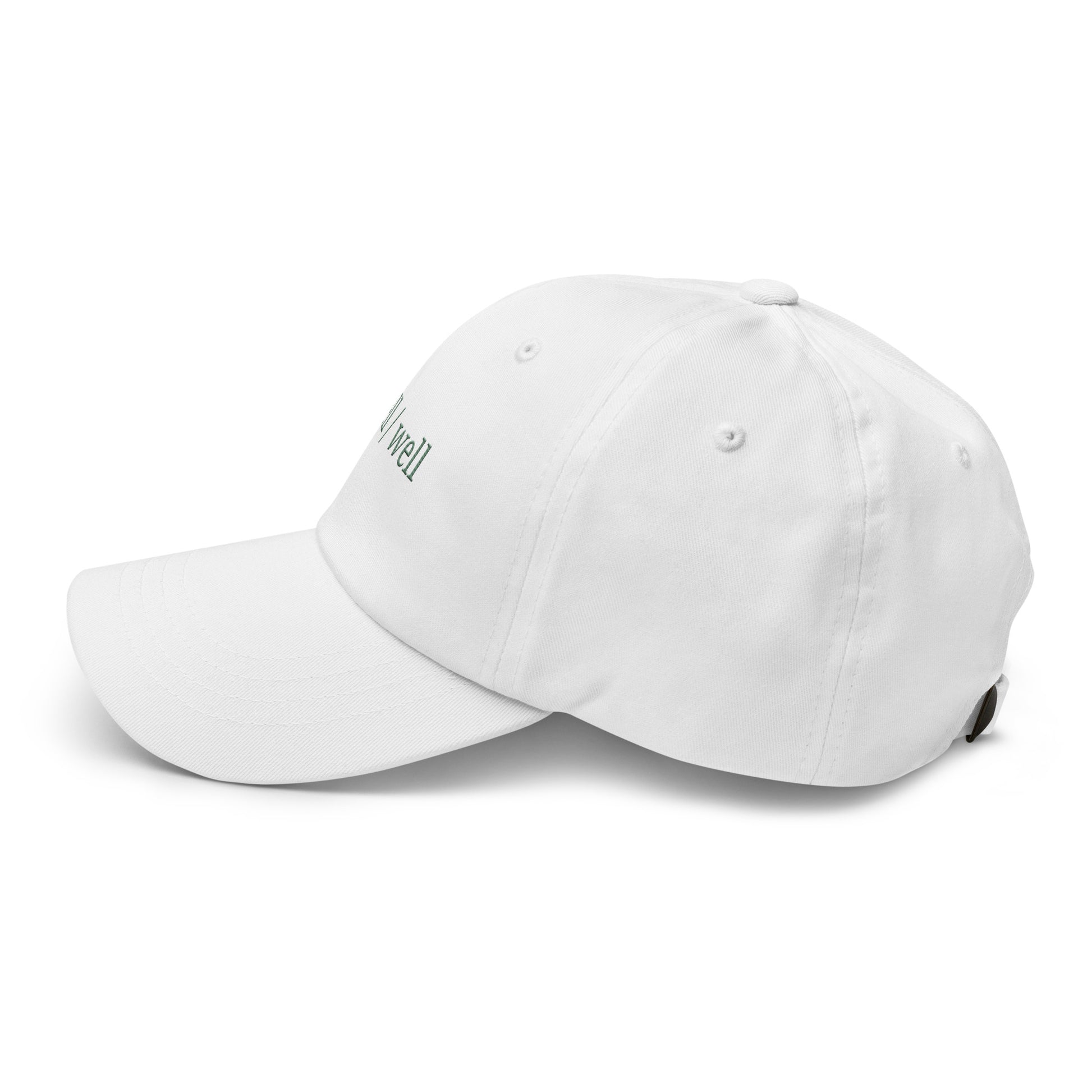 White baseball cap with 'Kari Traa' branding on a white background