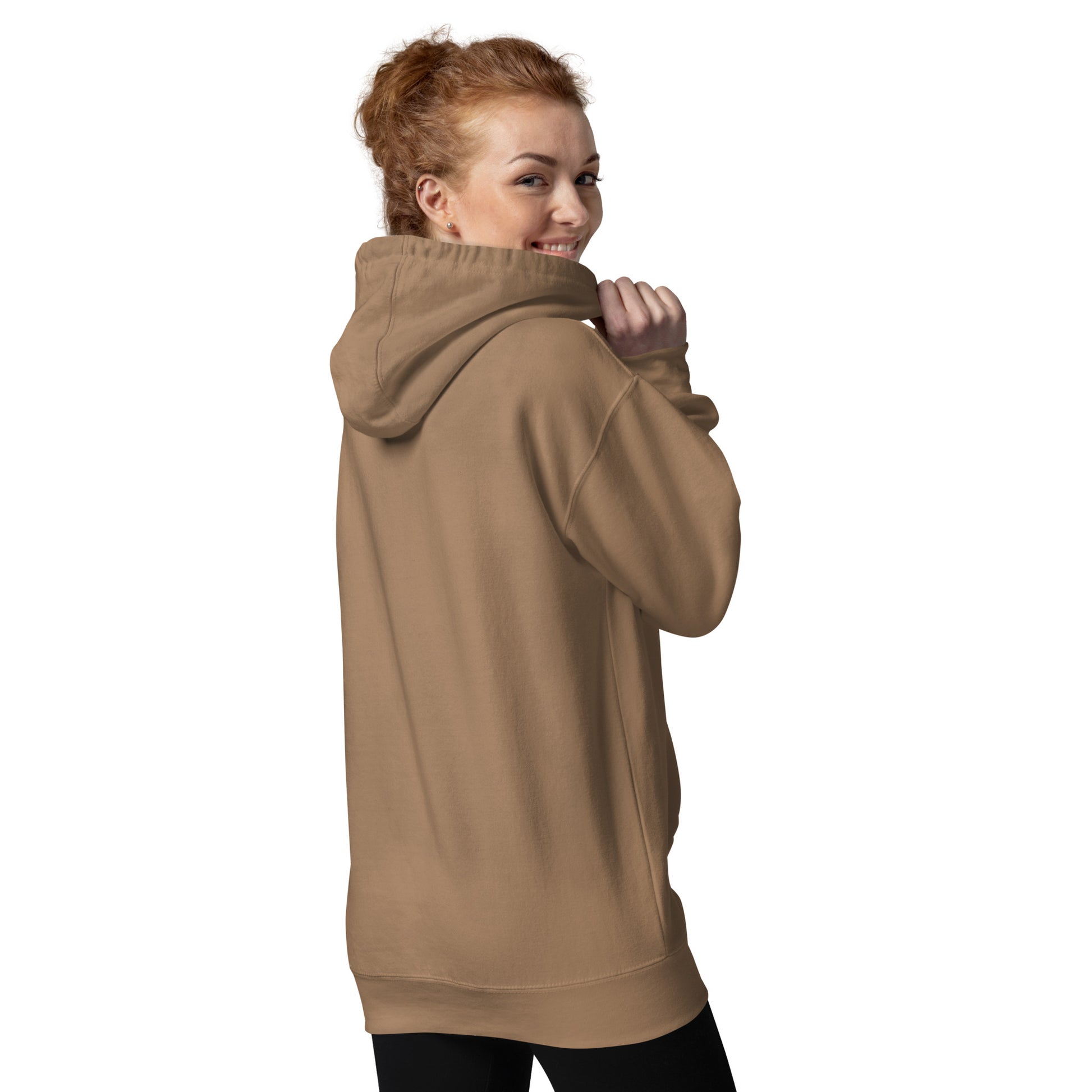 Woman wearing a beige hoodie on a white background
