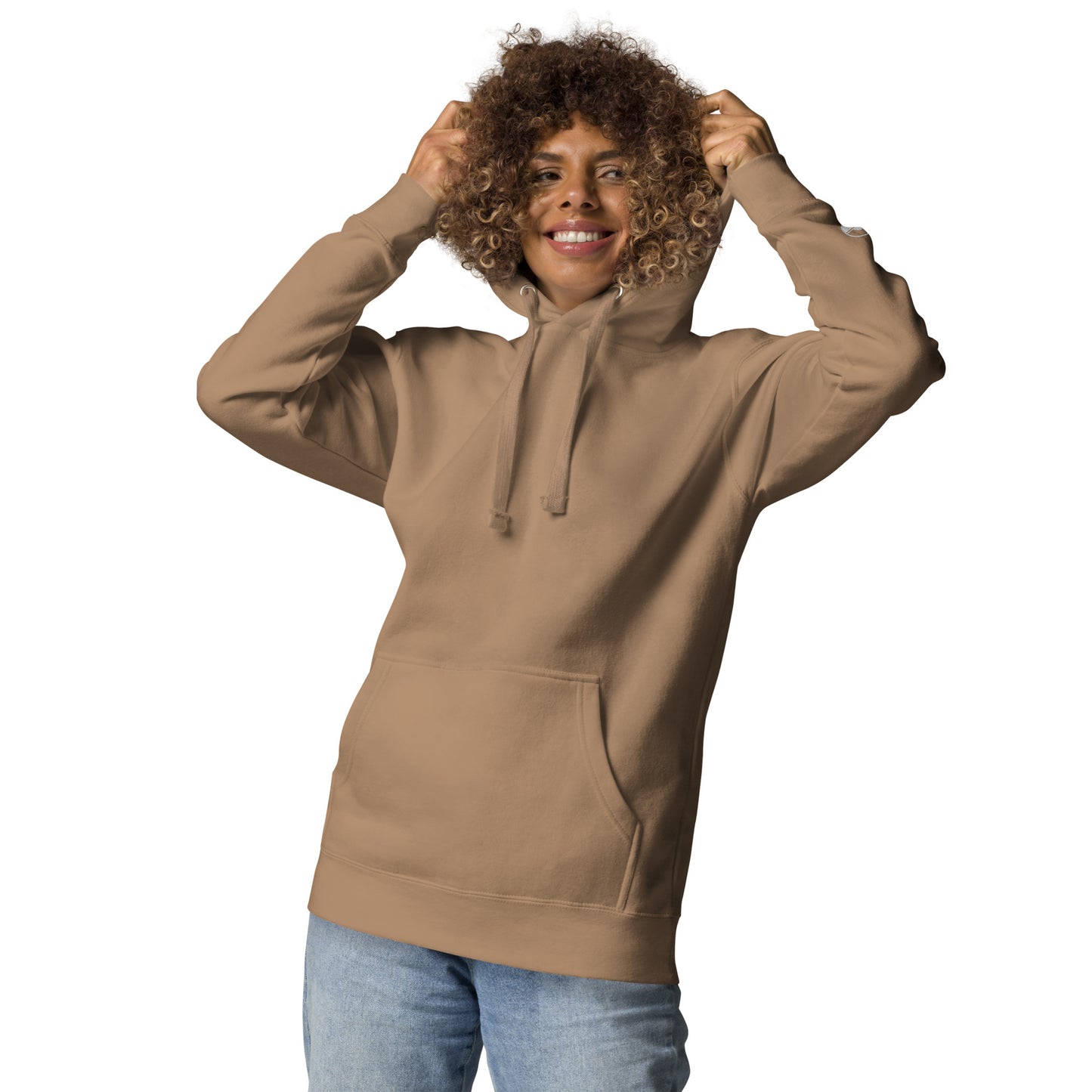 Person wearing a beige hoodie on a white background