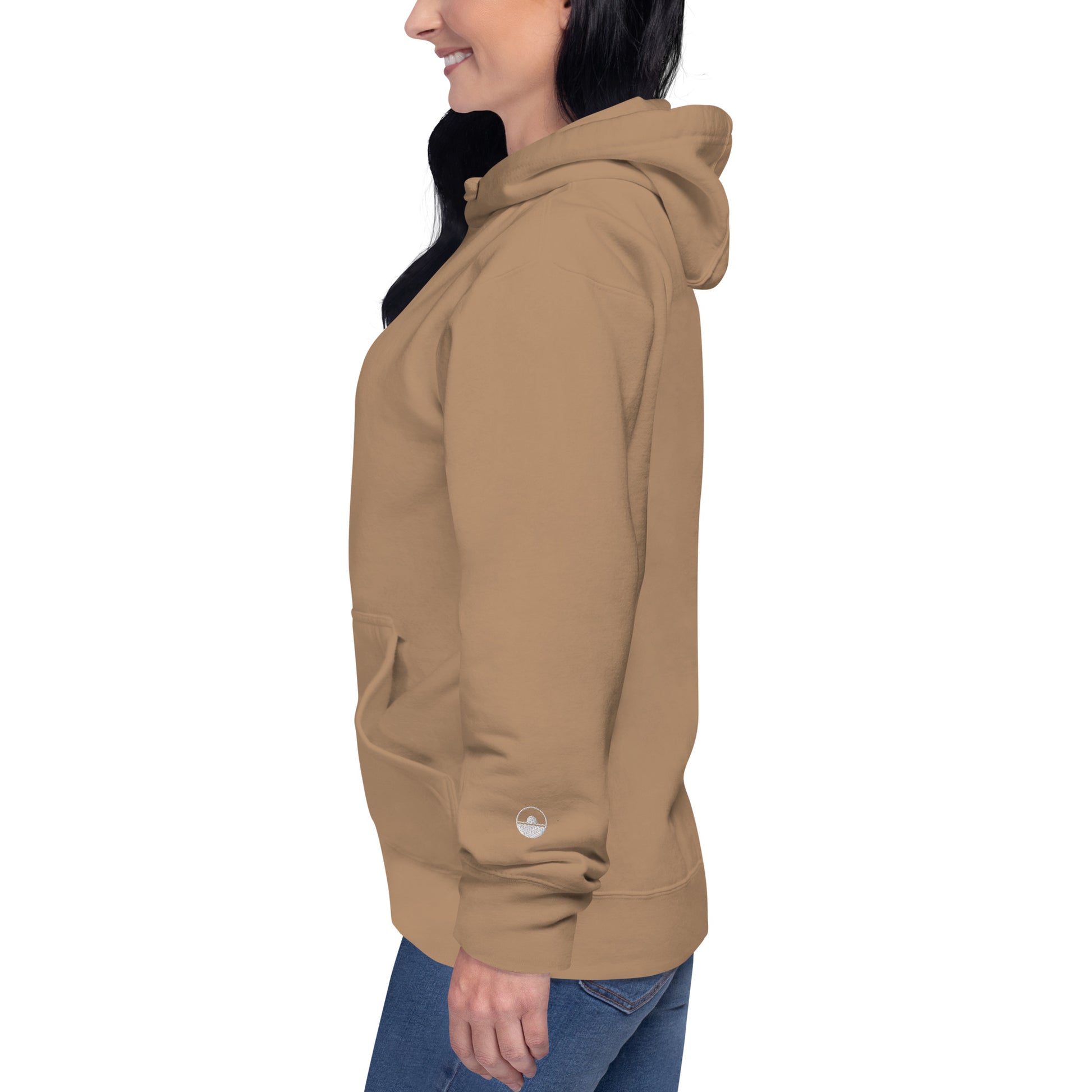 Person wearing a brown hoodie on a white background