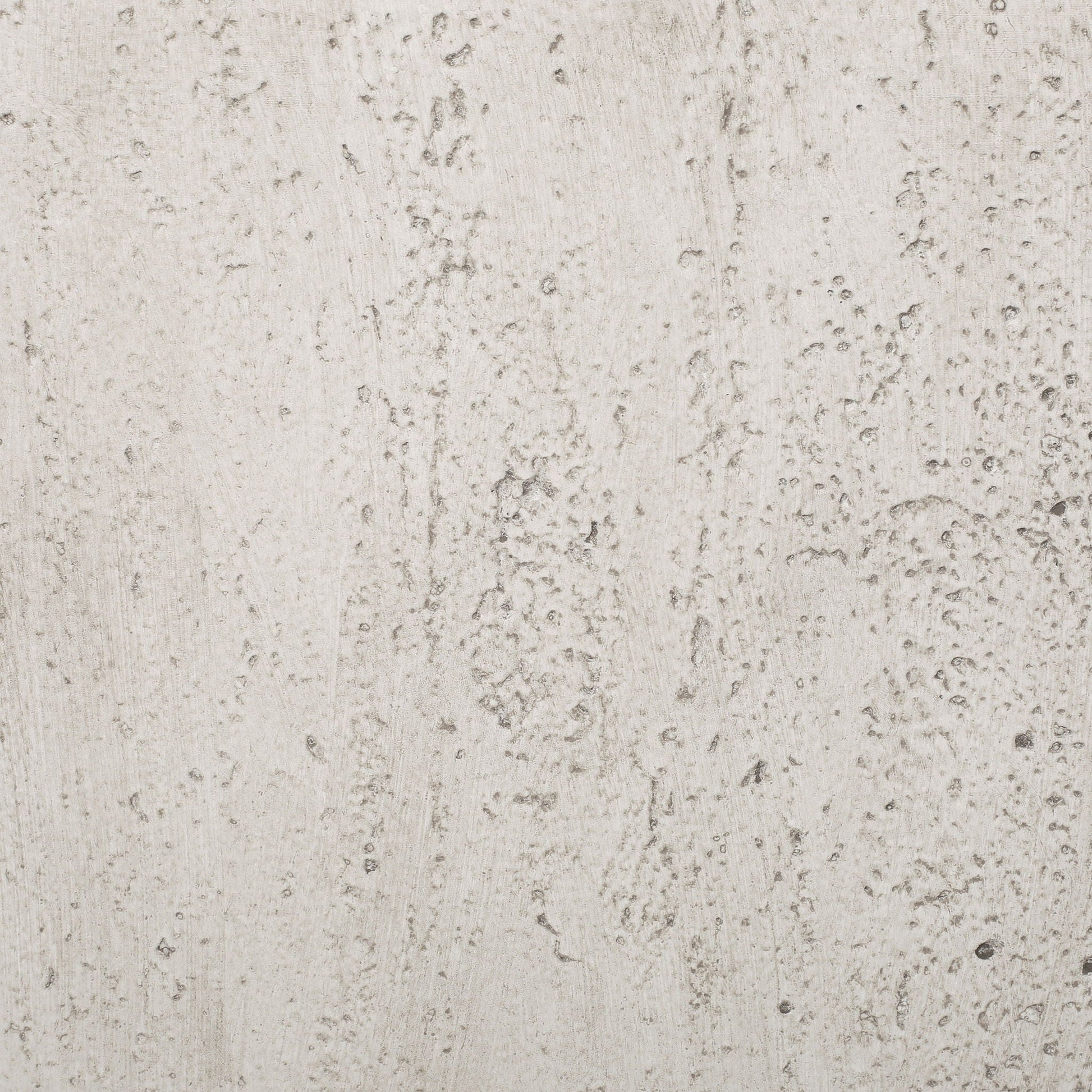 Close-up of a textured beige stone surface